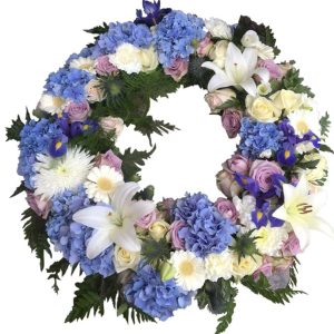 Begravnings krans med hortensia, liljor och rosor